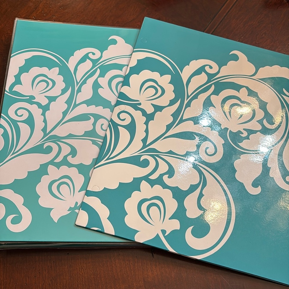 Set of a 1” printed binder & one folder. The “Versailles Collection by Studio C.